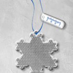 Hengerefleks hardbrikke formet som et snøkrystall var Trygg Trafikk sin hengerefleks til Refleksdagen 2007. Med tag Trygg Trafikk og Refleksdagen 2007